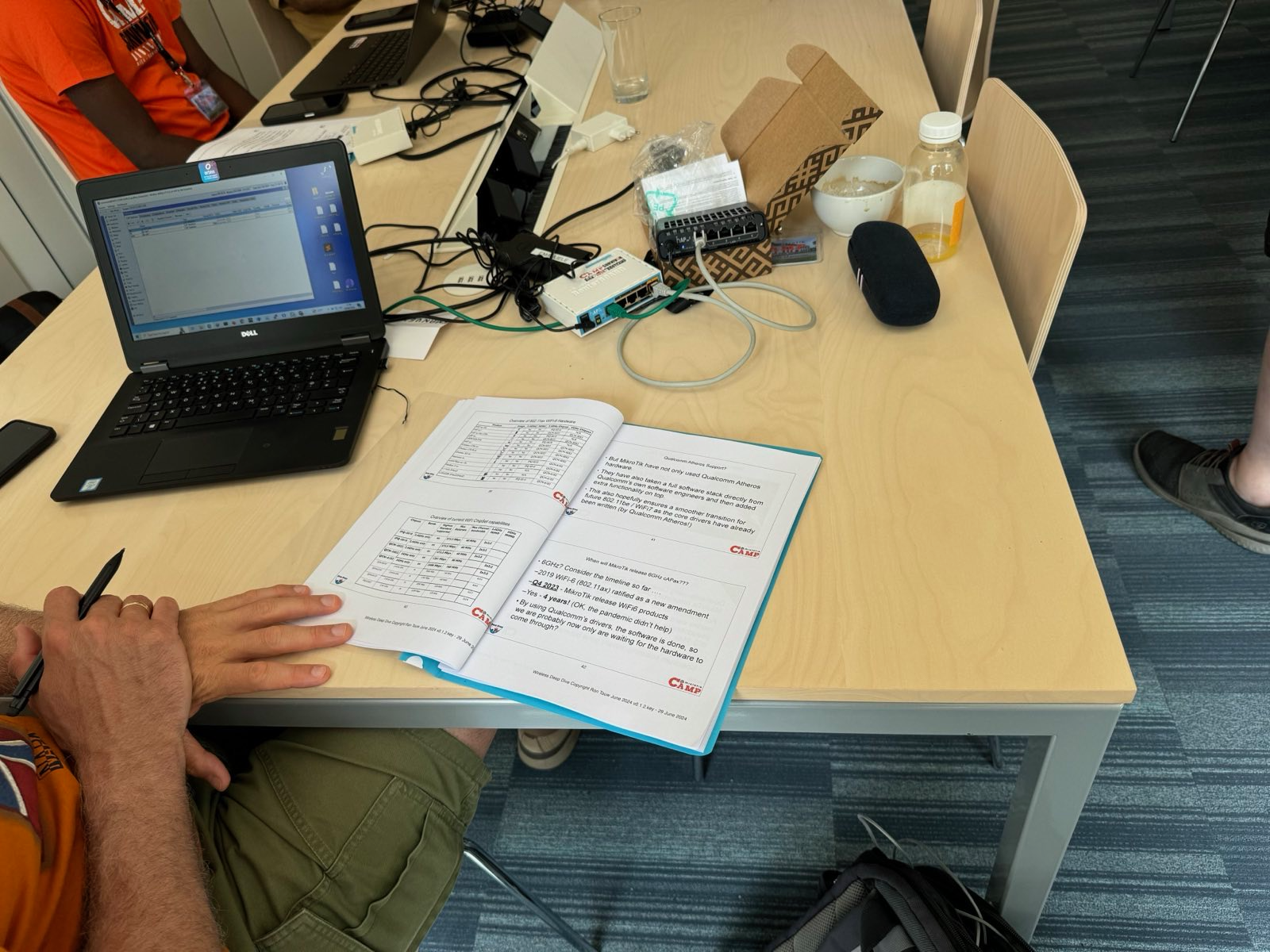 Photo of student laptop and training book